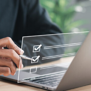 A person using a computer to do an online survey.